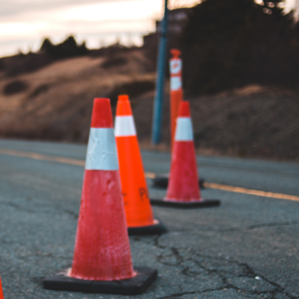 Red and White Cones on Road: road safety Ireland, prevent traffic accidents,